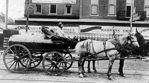 Late 19th or early 20th century, USA -- One of Standard Oil Company's (later Amoco Corporation) first tank wagons. --- Image by © Corbis